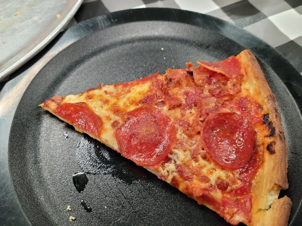 Thin Crust Pepperoni and Bacon Pizza